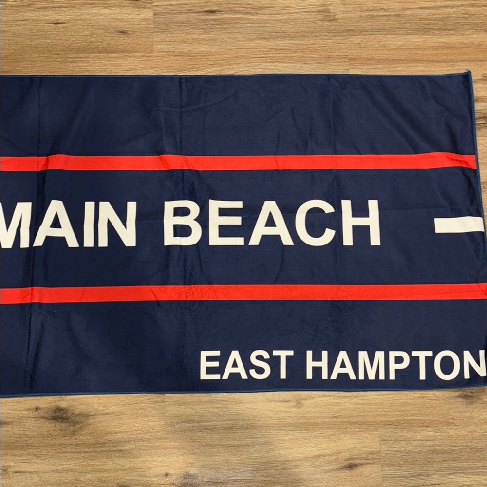 Navy Beach Towel with Red and White Stripes